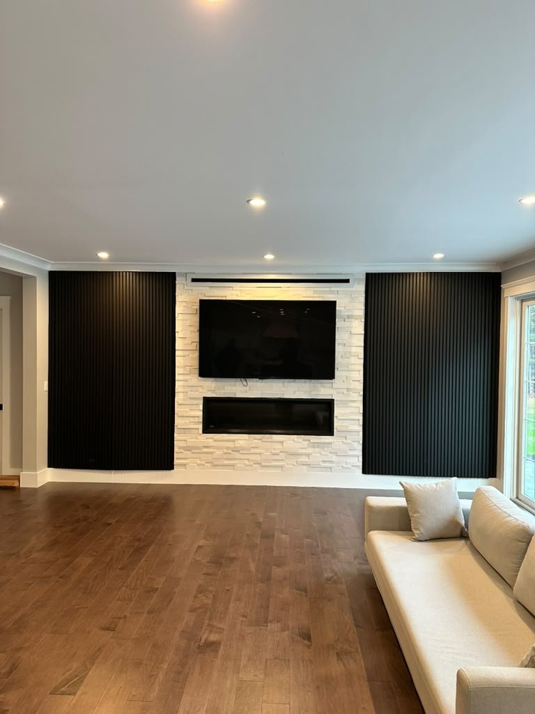 Chiamarelli custom media wall with concealed cabinetry